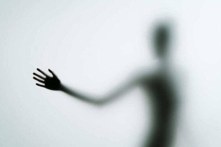 silhouette person s hand