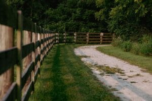 a path next to a fence